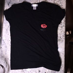 this here is a black shirt with a rose.